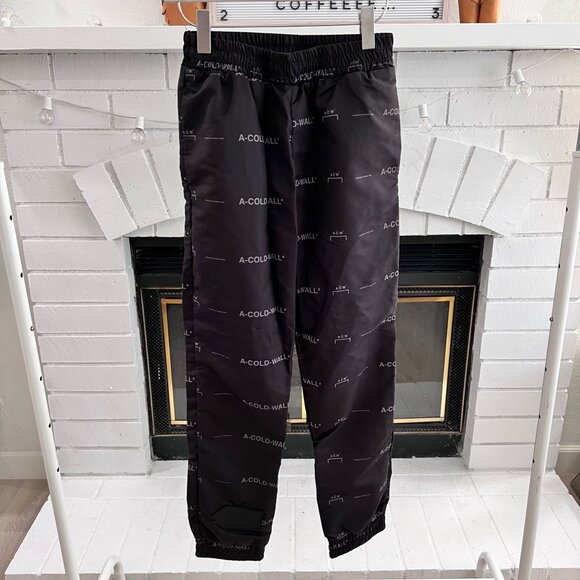 A-Cold-Wall* Black All-Over Logo Prints Nylon Jogger Pants - Picture 1 of 8